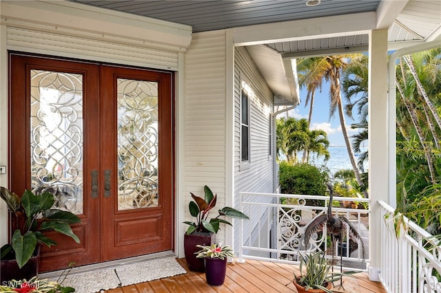 property entrance featuring french doors