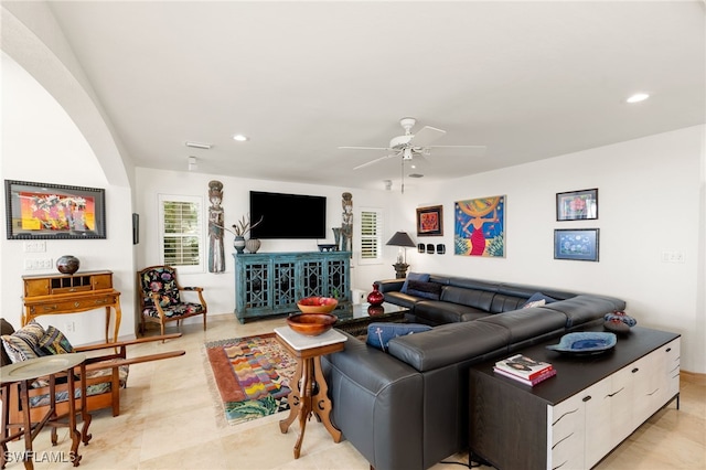 living room featuring ceiling fan