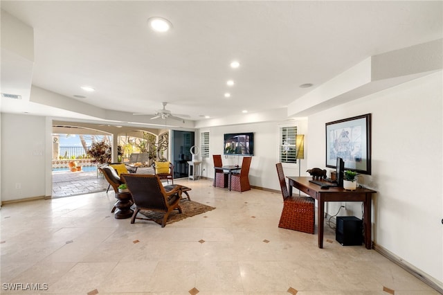 dining space with ceiling fan