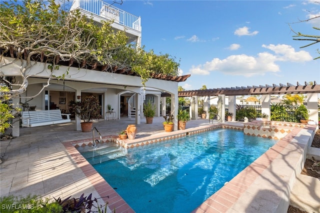 view of pool featuring a patio area