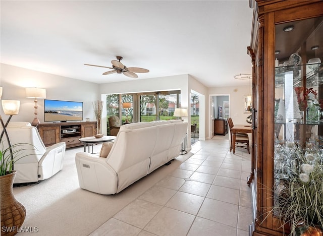 living room with light tile patterned floors and ceiling fan