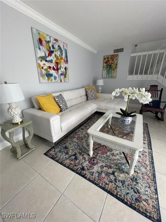 tiled living room with crown molding