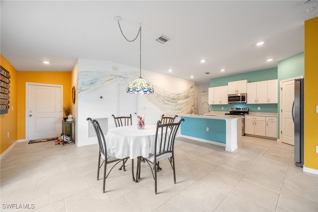 dining room with sink