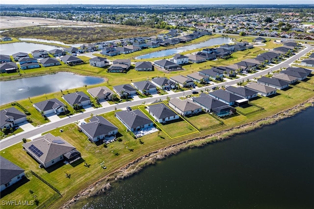 drone / aerial view featuring a water view