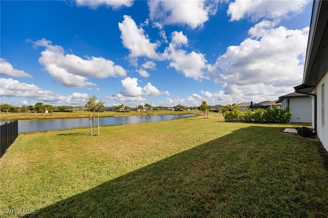 view of yard with a water view