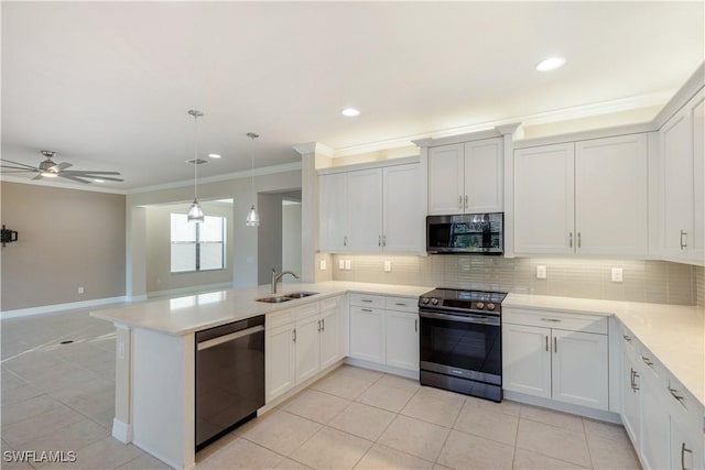 kitchen with kitchen peninsula, white cabinetry, hanging light fixtures, and stainless steel appliances