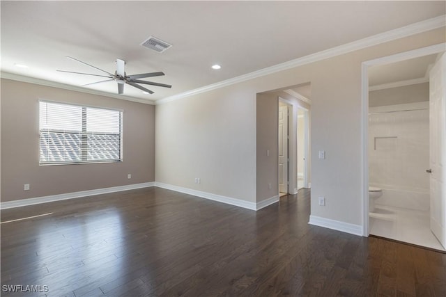 spare room featuring ceiling fan, dark hardwood / wood-style flooring, and crown molding