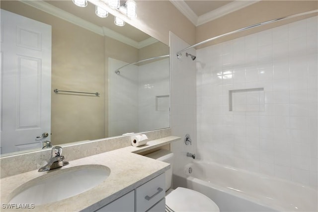 full bathroom featuring toilet, vanity, tiled shower / bath combo, and ornamental molding