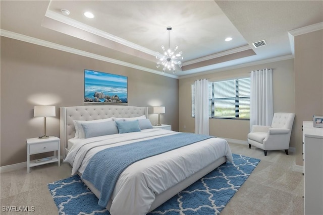 bedroom featuring a notable chandelier, ornamental molding, light carpet, and a tray ceiling