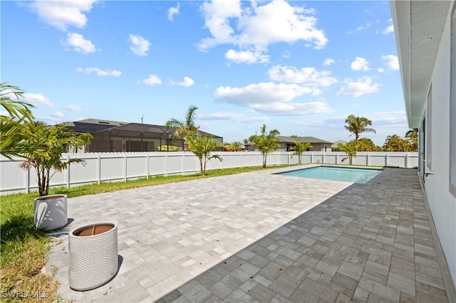 view of swimming pool with a patio