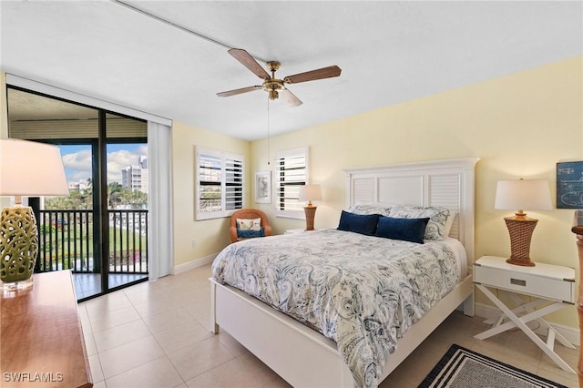 bedroom featuring ceiling fan, light tile patterned floors, and access to outside