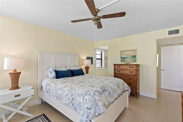 bedroom featuring ceiling fan and light tile patterned floors