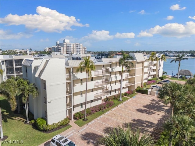 view of building exterior featuring a water view