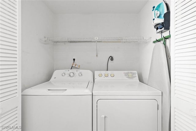 laundry room featuring washer and dryer