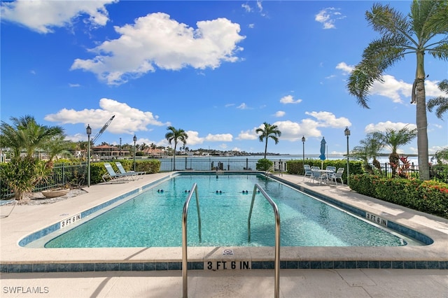 view of swimming pool featuring a patio