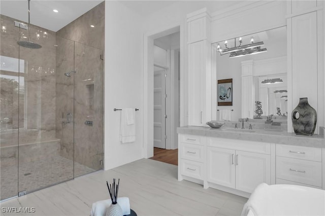 bathroom with vanity and walk in shower