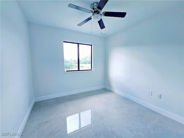 unfurnished room featuring ceiling fan