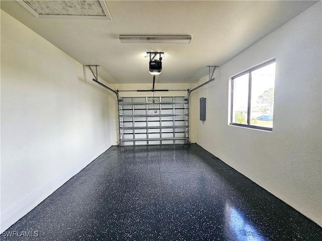 garage with electric panel and a garage door opener