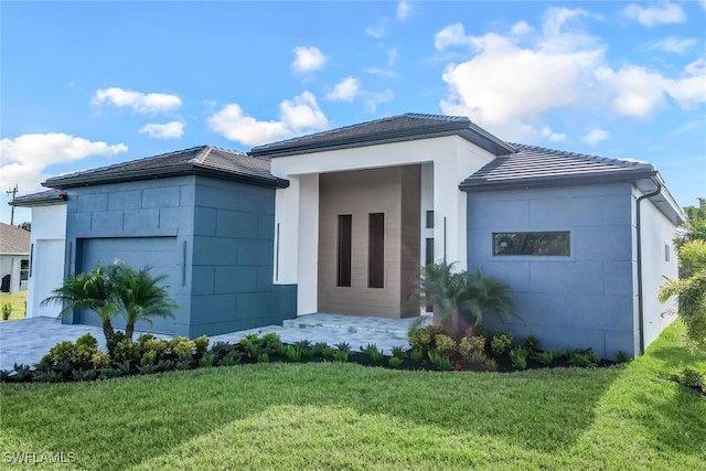 view of front of home with a front yard