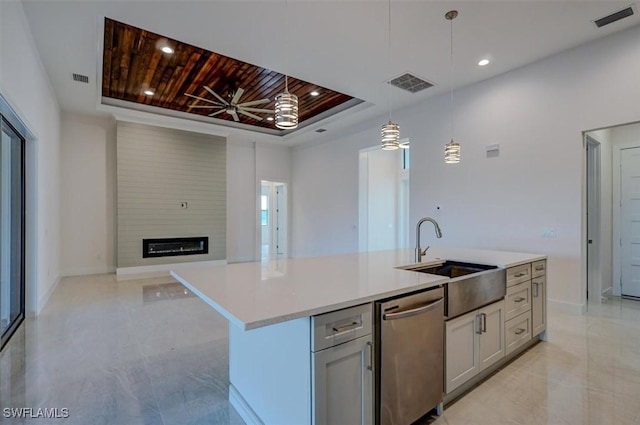 kitchen with ceiling fan, dishwasher, sink, an island with sink, and wood ceiling