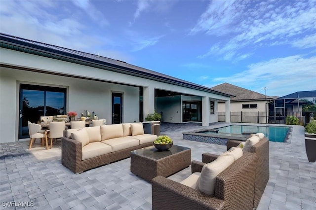 view of pool with an outdoor hangout area and a patio area