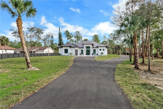 view of front of property with a front lawn