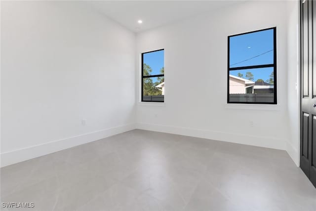 spare room featuring concrete floors