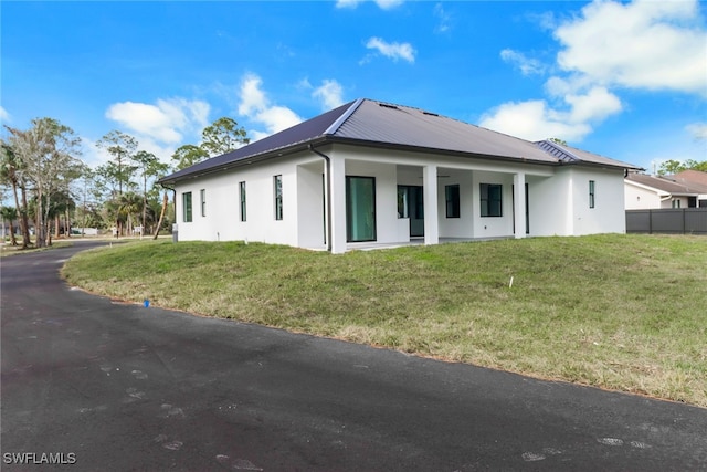 exterior space featuring a lawn