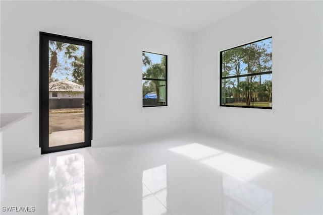 empty room featuring tile patterned flooring