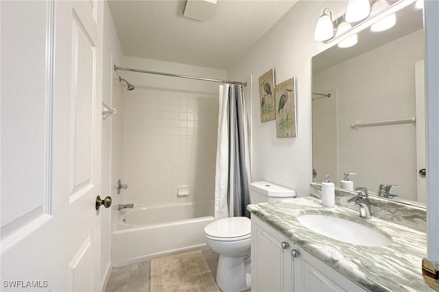 full bathroom featuring vanity, shower / bath combination with curtain, and toilet