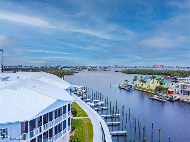 property view of water with a dock