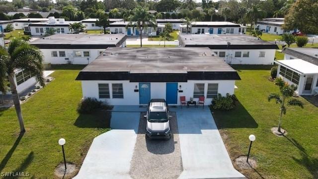 view of front of property with a front lawn