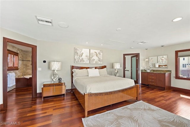 bedroom featuring dark wood-type flooring