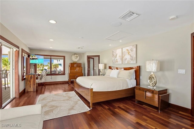 bedroom featuring access to exterior and dark wood-type flooring