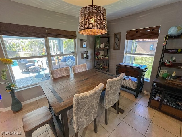 tiled dining area with plenty of natural light