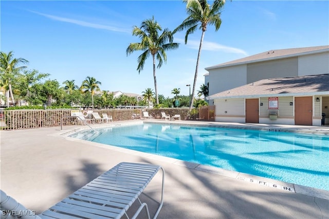 view of swimming pool with a patio area