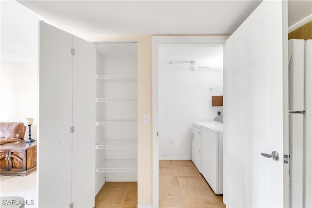 interior space with washing machine and clothes dryer