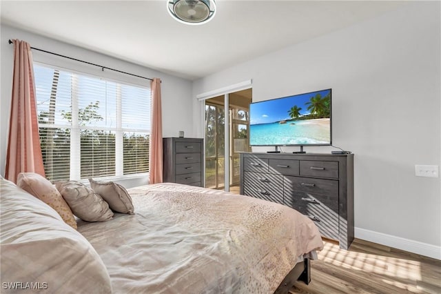 bedroom featuring light hardwood / wood-style floors