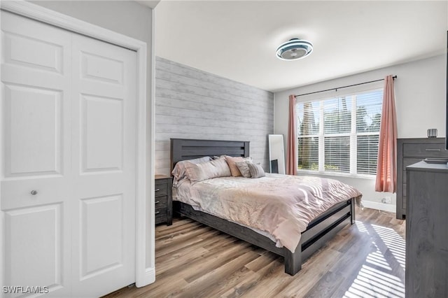 bedroom with light hardwood / wood-style flooring