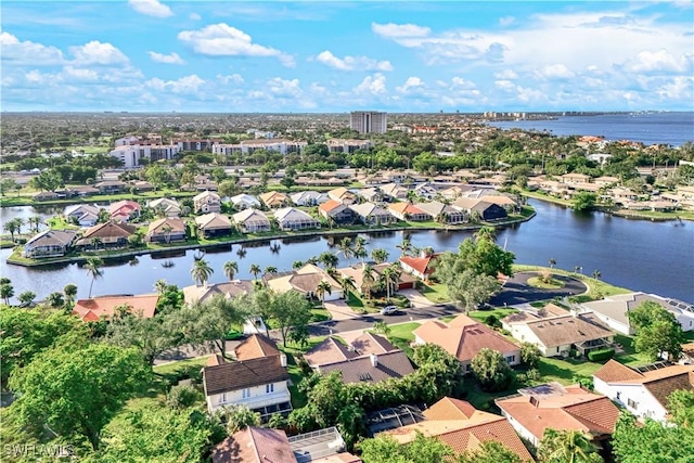 bird's eye view with a water view