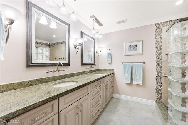 bathroom with vanity, a shower, and crown molding