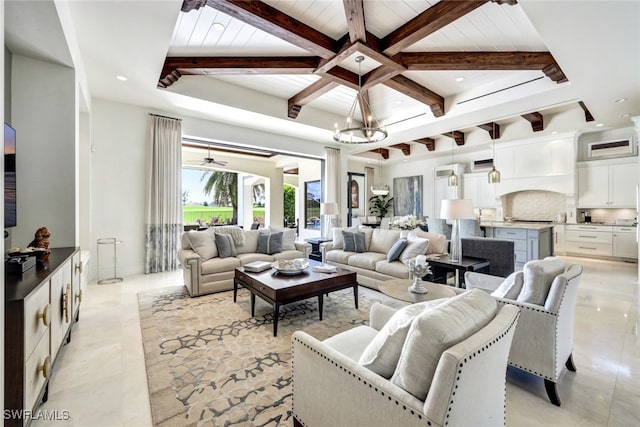 tiled living room with beamed ceiling and ceiling fan with notable chandelier