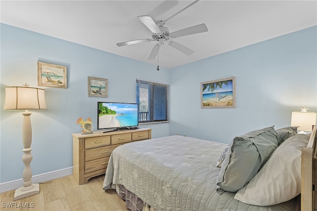 bedroom with light wood-type flooring and ceiling fan