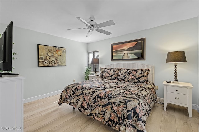 bedroom featuring ceiling fan and light hardwood / wood-style flooring