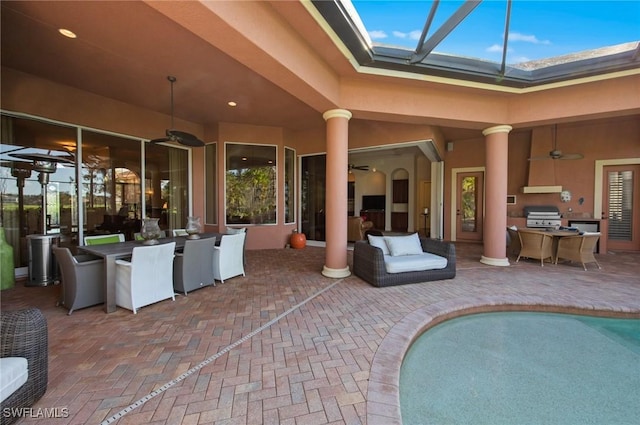 view of patio / terrace featuring ceiling fan and a grill