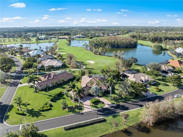 bird's eye view featuring a residential view, view of golf course, and a water view