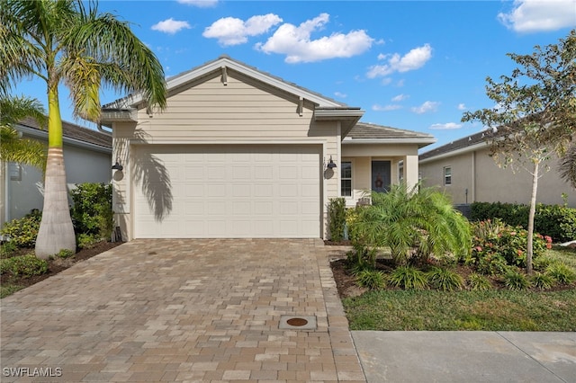 view of front of house with a garage