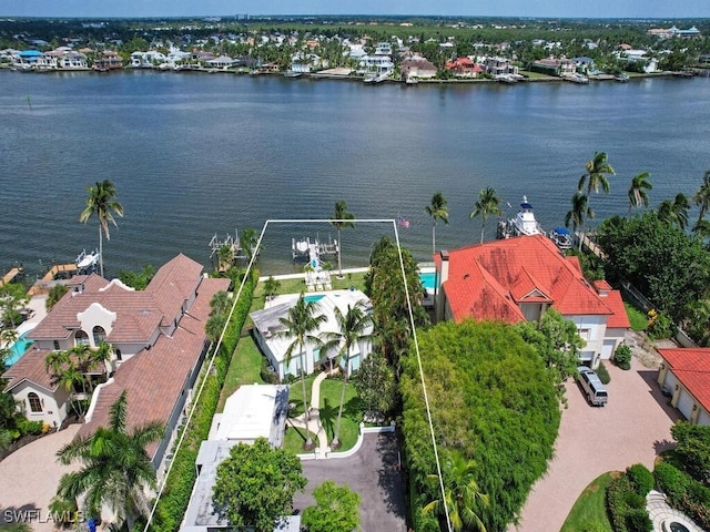 drone / aerial view with a water view