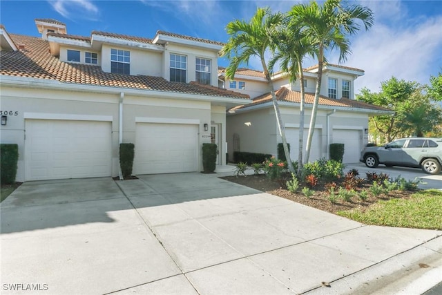 view of front of property featuring a garage