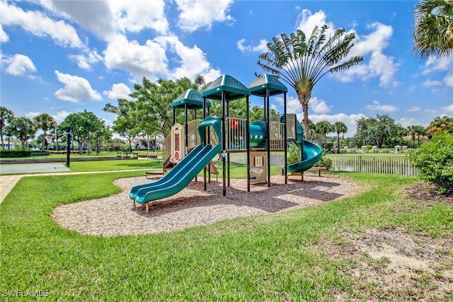 view of playground with a lawn